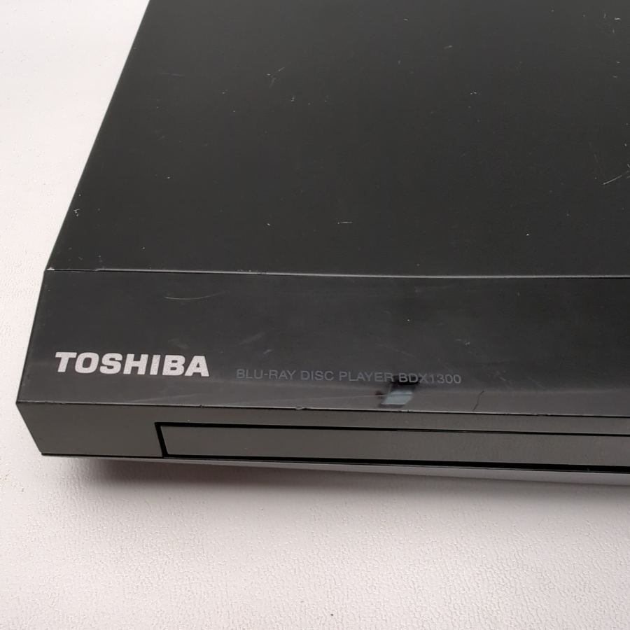 Representative photograph of the same model: TOSHIBA BDX1300 Blu-Ray & DVD Compact Small Player Remote HDMI Cable Warranty – image 6