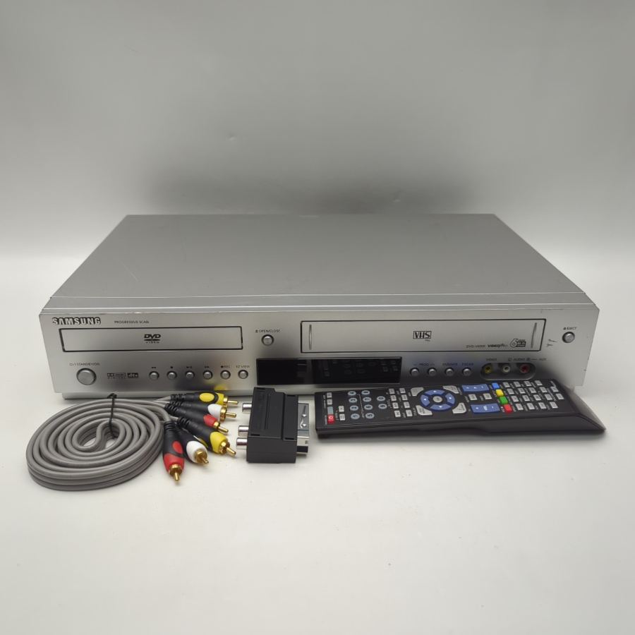 Representative photograph of the same model: Samsung DVD‑V6000 VHS / VCR/ DVD Dual Deck Player Recorder Premium Bundle – image 2