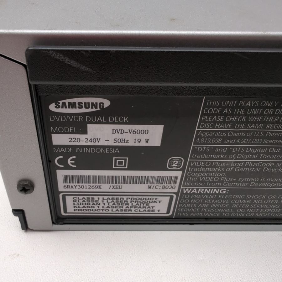 Representative photograph of the same model: Samsung DVD‑V6000 VHS / VCR/ DVD Dual Deck Player Recorder Premium Bundle – image 9